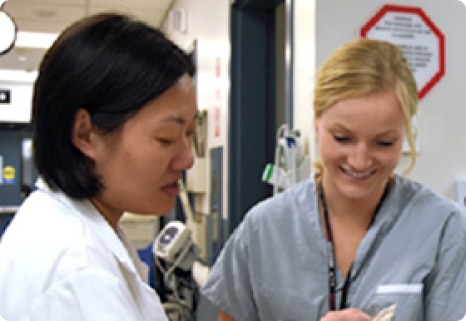 Two nurses talking