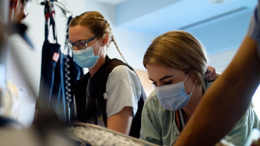 Nurses with patient