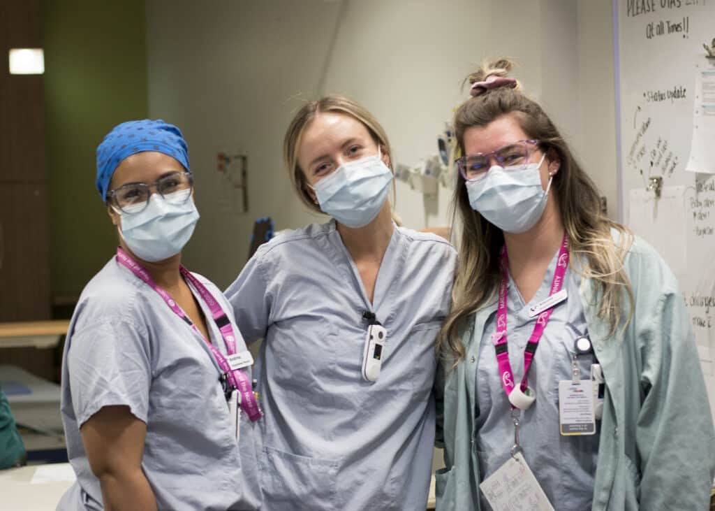 Three nurses posing for camera