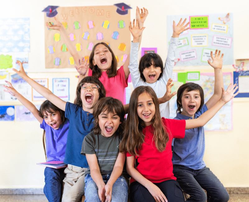 Group of children posing for the camera.