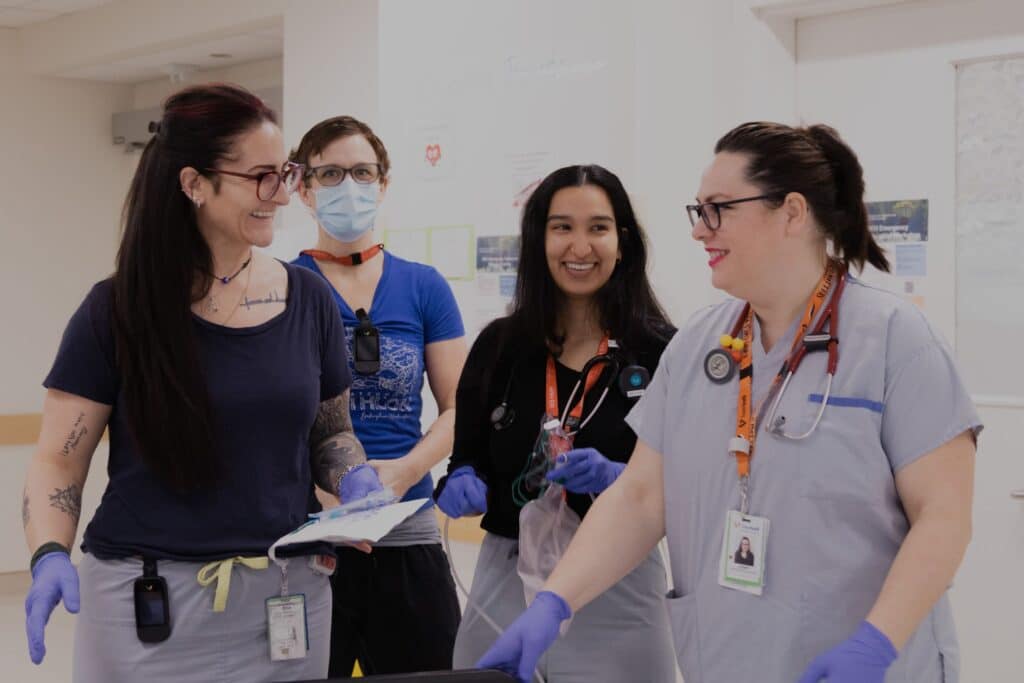 Staff at Abbotsford Regional Hospital chatting.