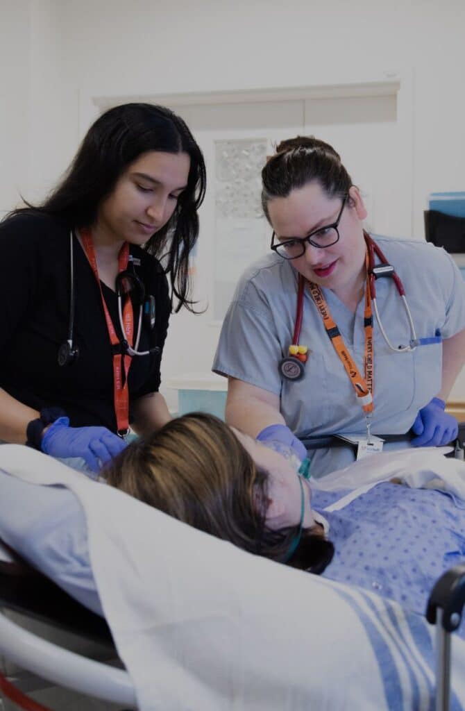 Staff with patient at Abbotsford Regional Hospital.