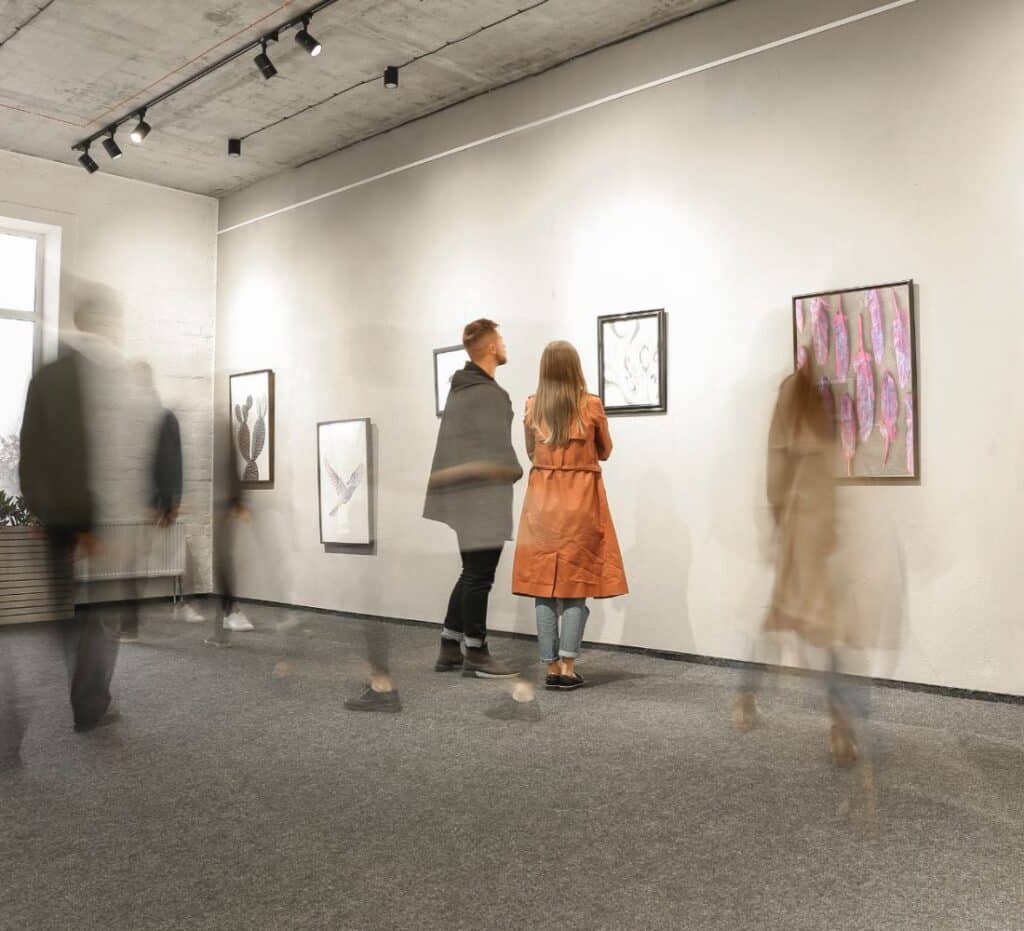 Blurred image of people in an art gallery