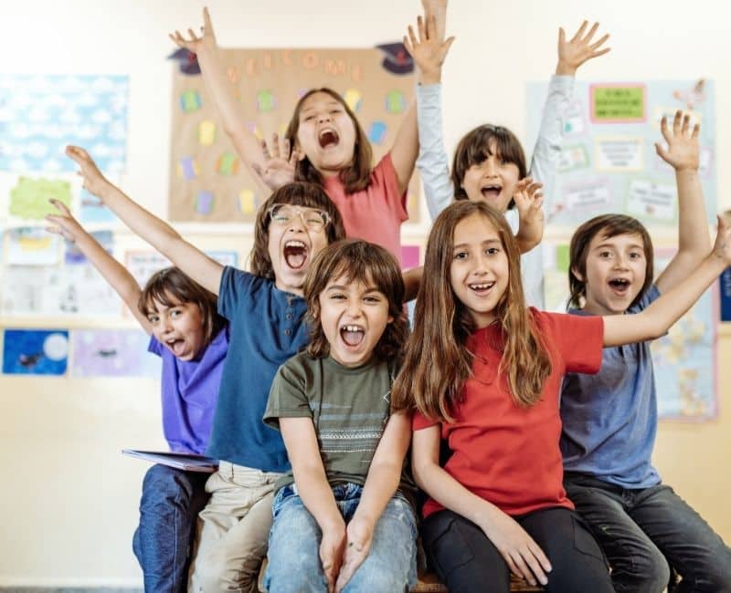 Group of children posing for the camera.
