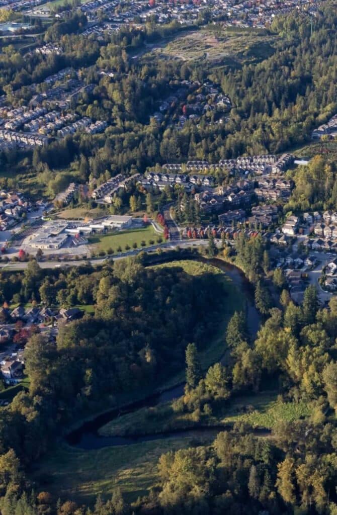Aerial view of houses, trees and green space in Silver Valley in Maple Ridge, B.C.
