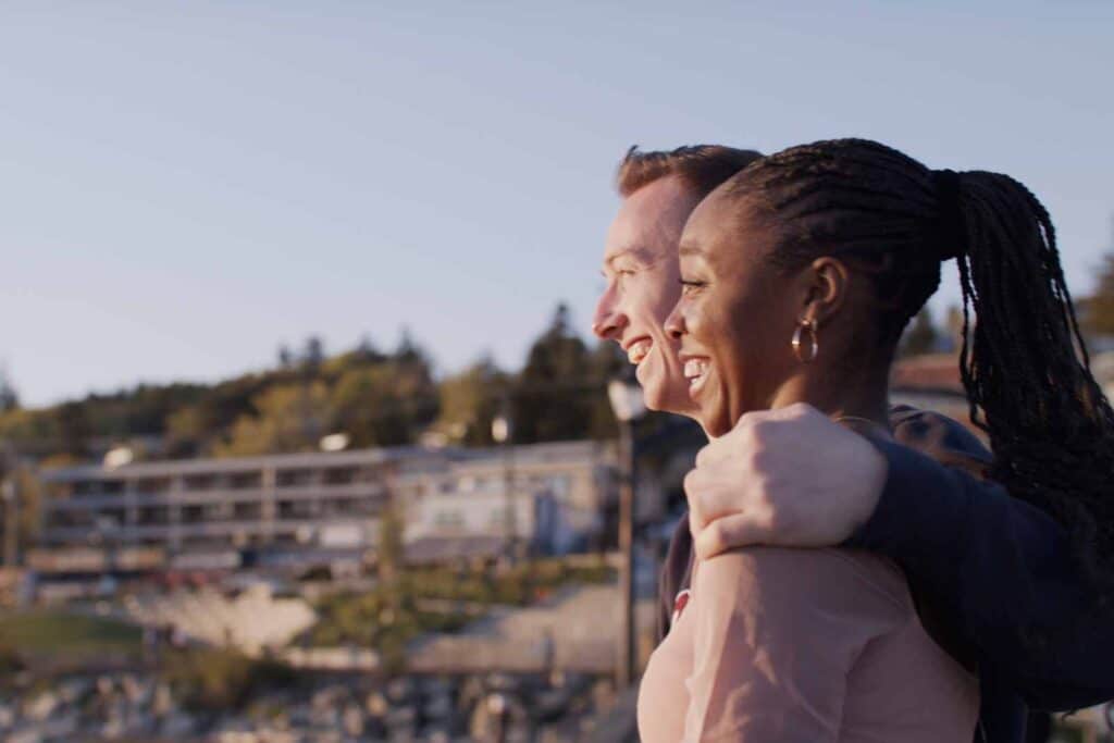 Couple walking in White Rock.