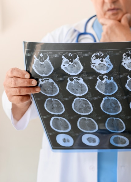 Physician looking at chart.