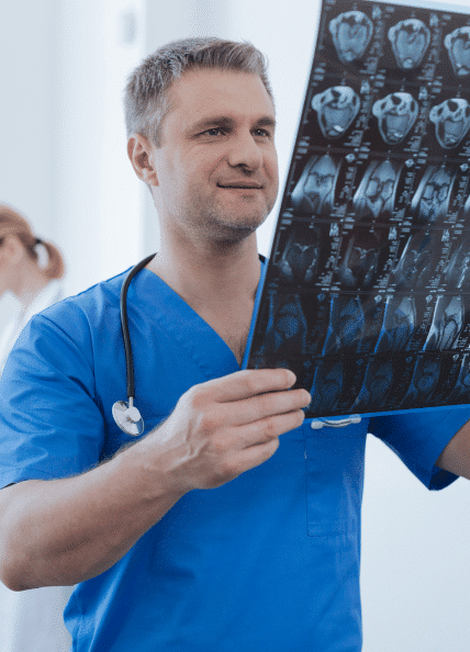 Physician looking at chart.