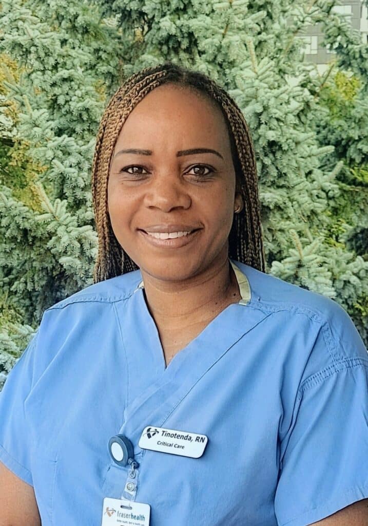 Registered nurse smiling in nursing uniform
