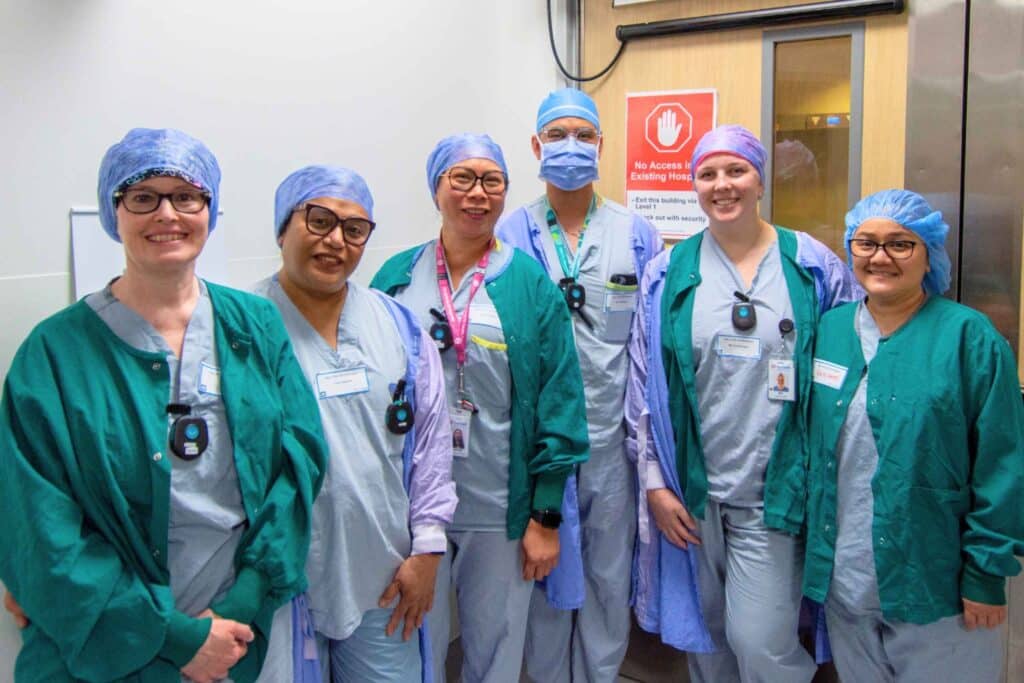 Team of nurses and doctors in scrubs at Burnaby Hospital