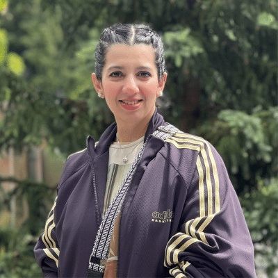 Fraser Health occupational therapist pictured outdoors in front of trees